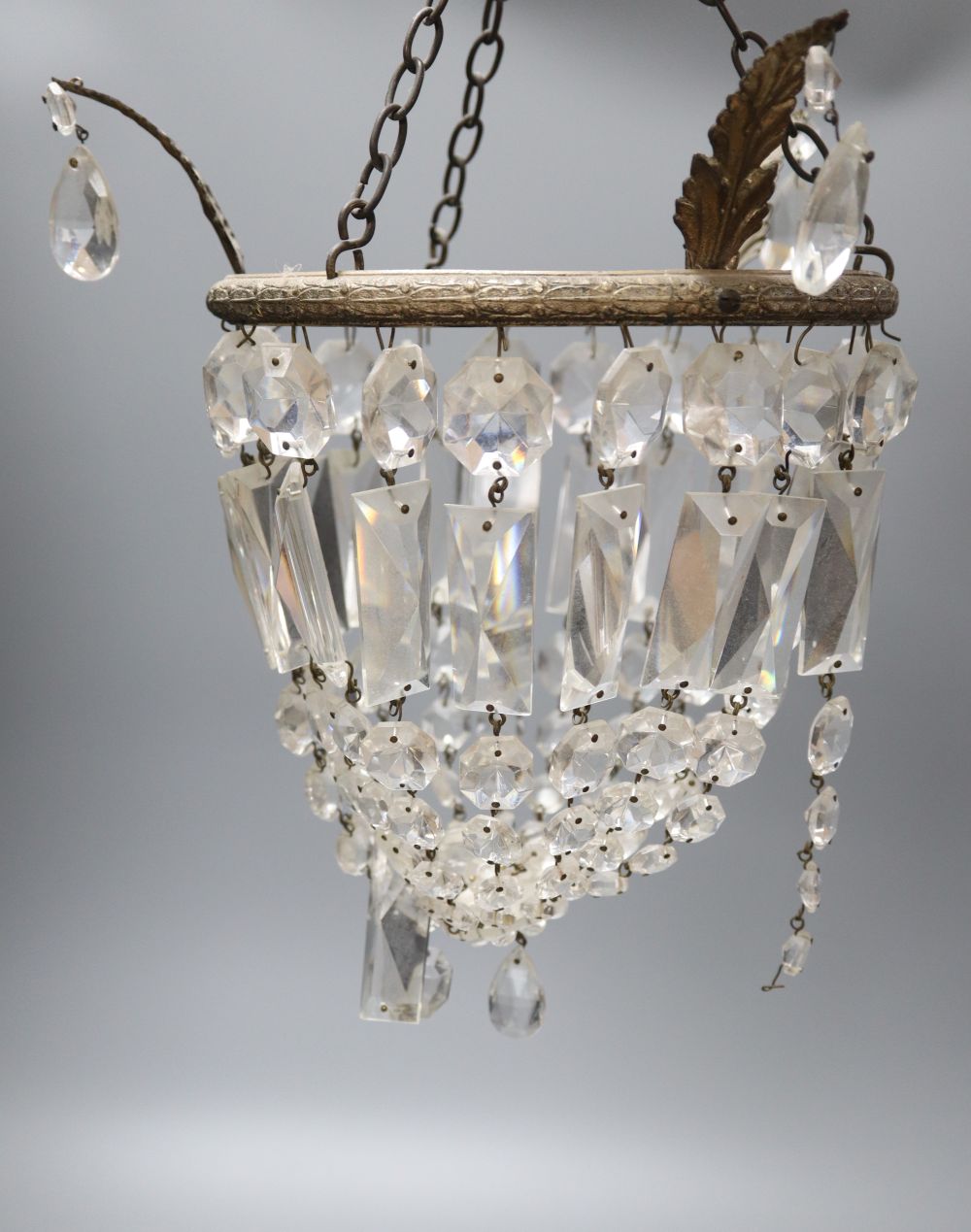 A pair of cut glass lustre drop bag chandeliers